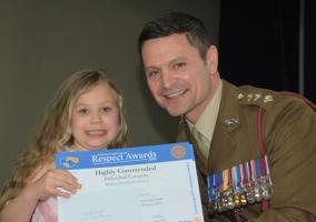 Captain Adam Divers presented a special award for courage to Jessica Smith, who helped save her father's life when he collapsed during the night.